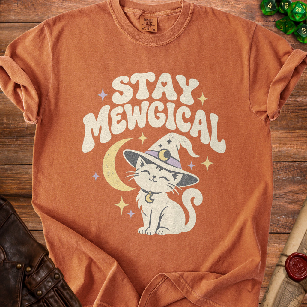 Orange Comfort Colors t-shirt with "STAY MEWGICAL" and a cat in a witch hat.