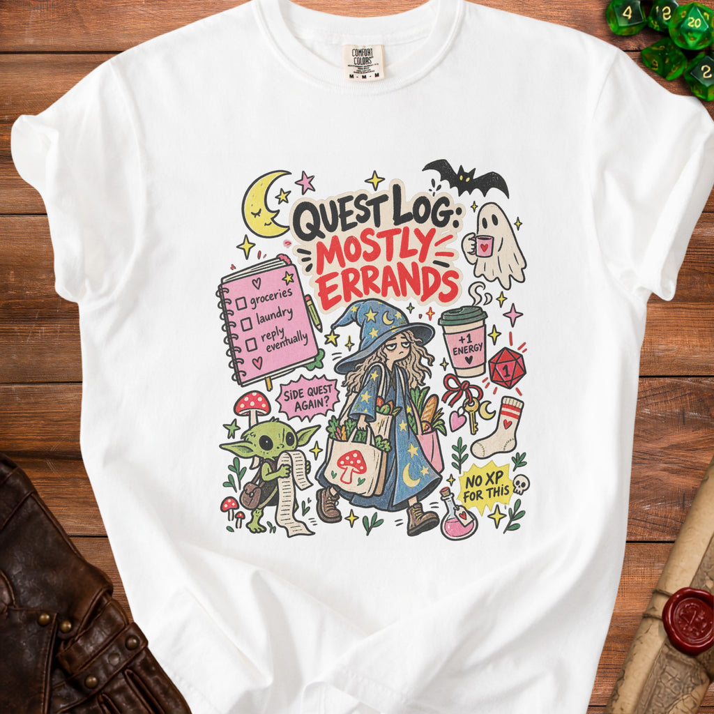 White t-shirt with "Quest Log: Mostly Errands" graphic featuring a wizard and goblin.