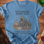 Blue t-shirt with graphic: "Dungeons were fun until real life became the boss fight."