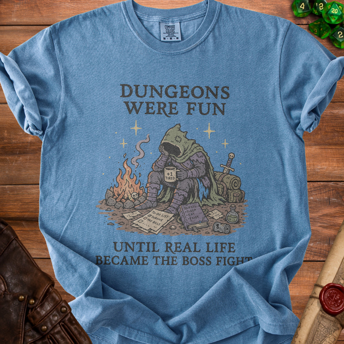 Blue t-shirt with graphic: "Dungeons were fun until real life became the boss fight."