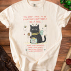 Cream t-shirt with black cat dressed as a bee holding honey.