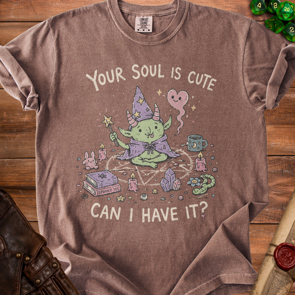 Brown t-shirt with illustration of a green goblin wizard, spells, and text "Your soul is cute, can I have it?".