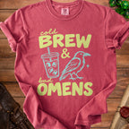Crimson t-shirt with "Cold Brew & Bad Omens" text, iced coffee cup, and raven graphic.