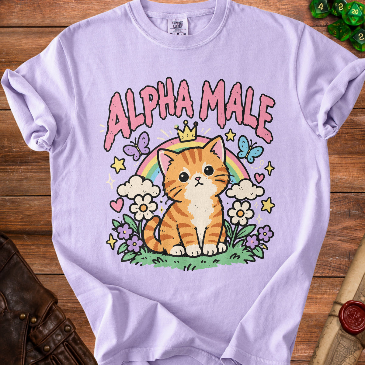 Lavender t-shirt with a cartoon cat, rainbow, and the words "ALPHA MALE".