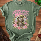 Green t-shirt with "Emotional Support Gremlin" text and a kitten in a witch hat.
