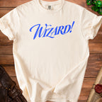 Cream t-shirt with blue "Wizard!" text and Comfort Colors tag.