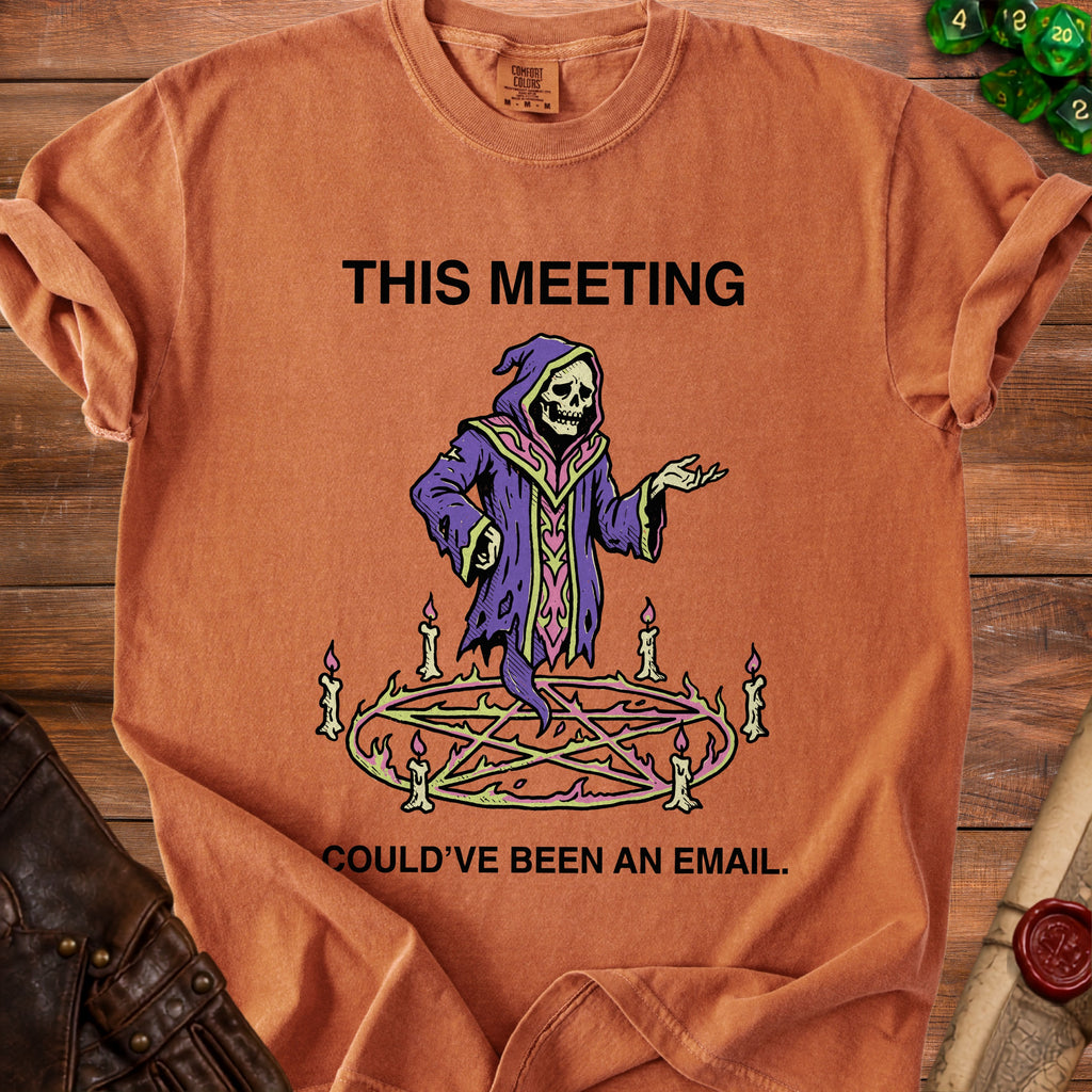 Grim reaper graphic on an orange t-shirt reads "This meeting could've been an email."