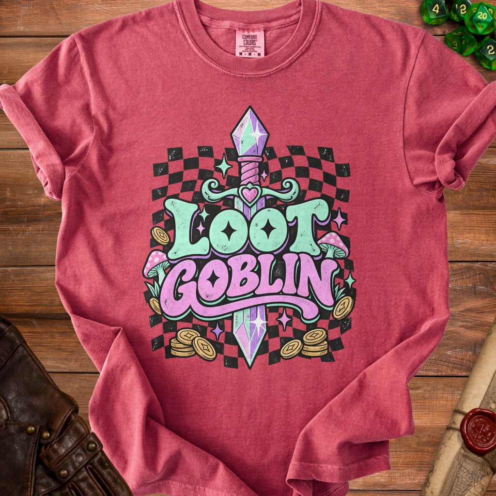 Red t-shirt with "Loot Goblin" text, sword, mushrooms, and coins graphic.