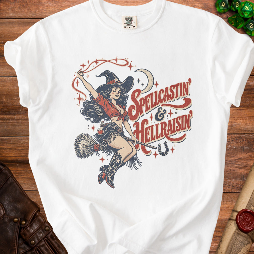 White t-shirt with vintage witch graphic and text "Spellcastin & Hellraisin".