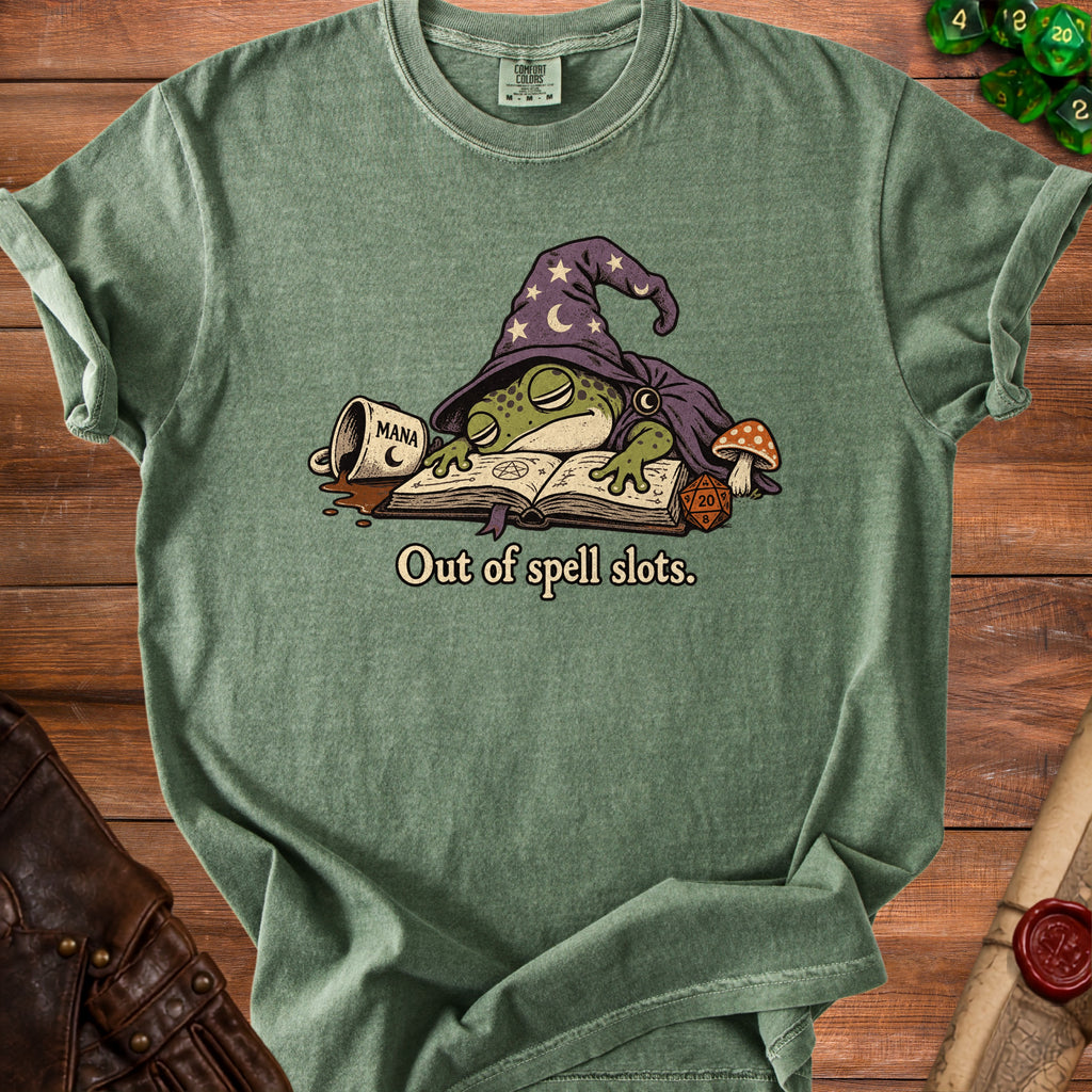 T-shirt with green wizard frog sleeping on a book, text reads "Out of spell slots."