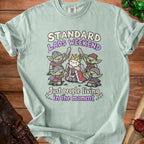 Light mint t-shirt with cartoon goblins and crown, reads "Standard Lads Weekend Just people living in the moment".