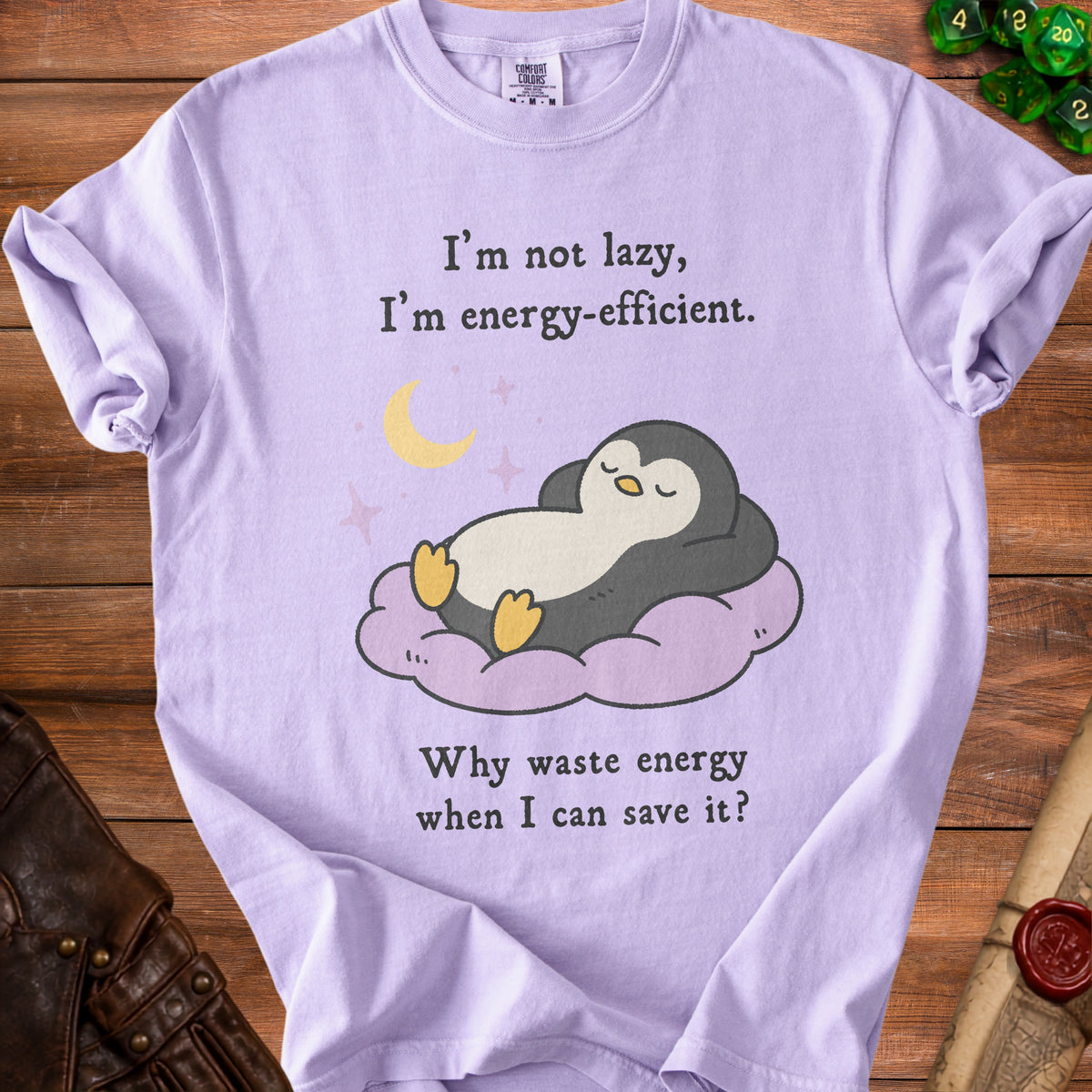 Light purple t-shirt with a sleeping penguin graphic and text.