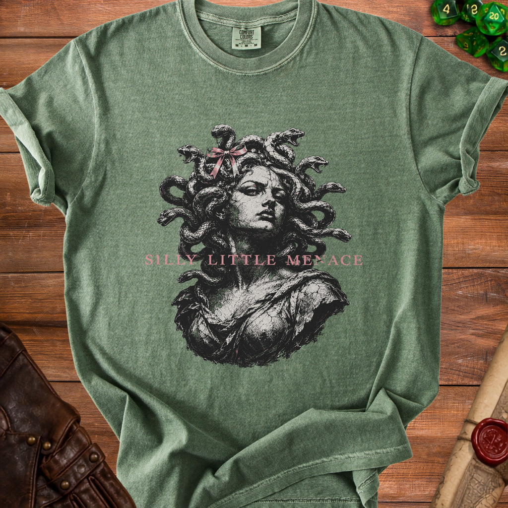 Green t-shirt with Medusa graphic and "Silly Little Menace" text.