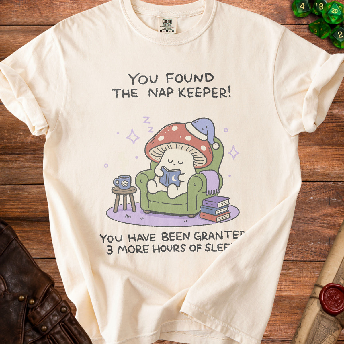 Cream t-shirt with graphic: "You Found The Nap Keeper! You Have Been Granted 3 More Hours of Sleep!"