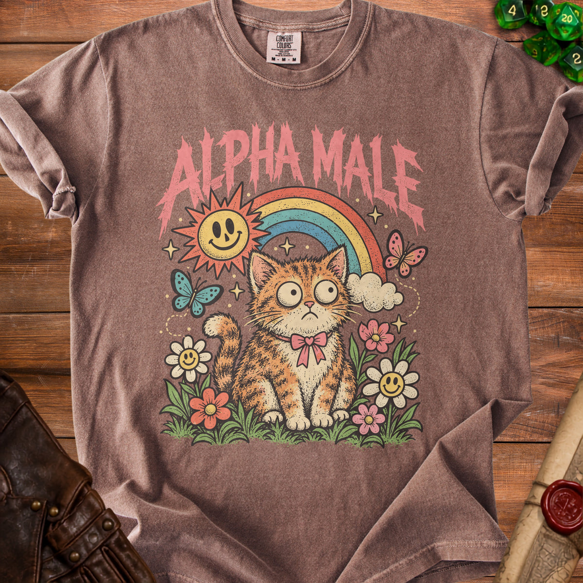 Brown t-shirt with "ALPHA MALE" text and a cartoon cat with a rainbow.