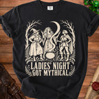Black t-shirt with illustration of three women and a cauldron, reads "LADIES' NIGHT GOT MYTHICAL".