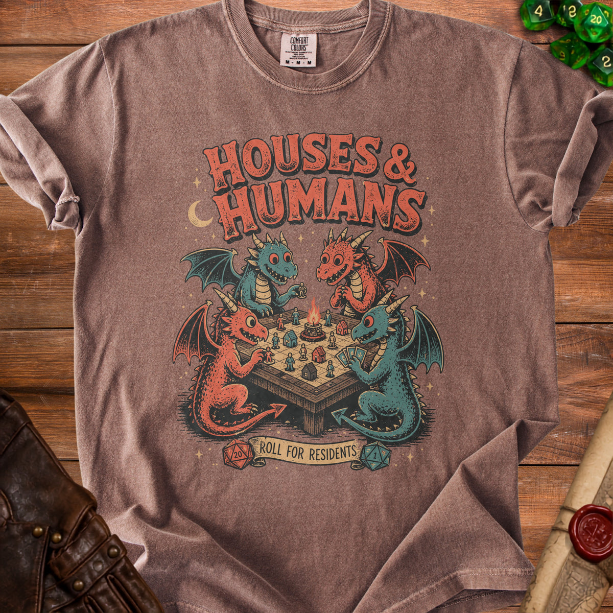 T-shirt with dragons playing a board game, text "Houses & Humans" and "Roll For Residents".