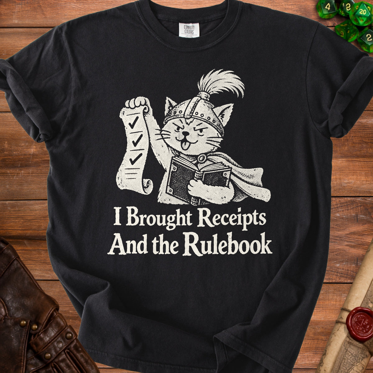 Black t-shirt with cat in armor holding checklist and book, text "I Brought Receipts And the Rulebook".