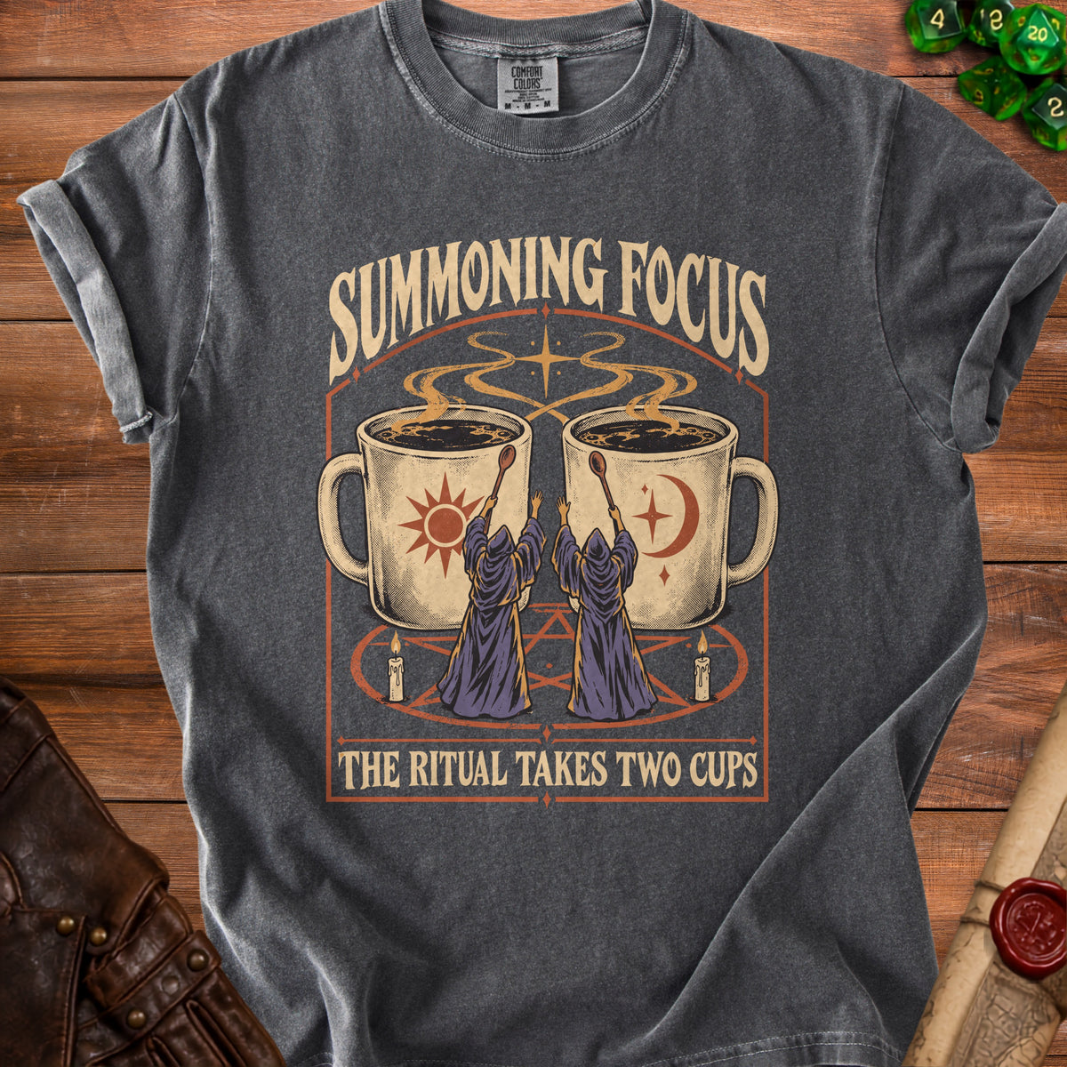 Summoning Focus t-shirt with coffee cups, wizards, and text "The Ritual Takes Two Cups".