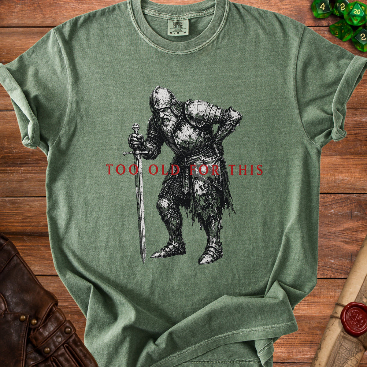 Green t-shirt with "Too Old For This" text and knight graphic.