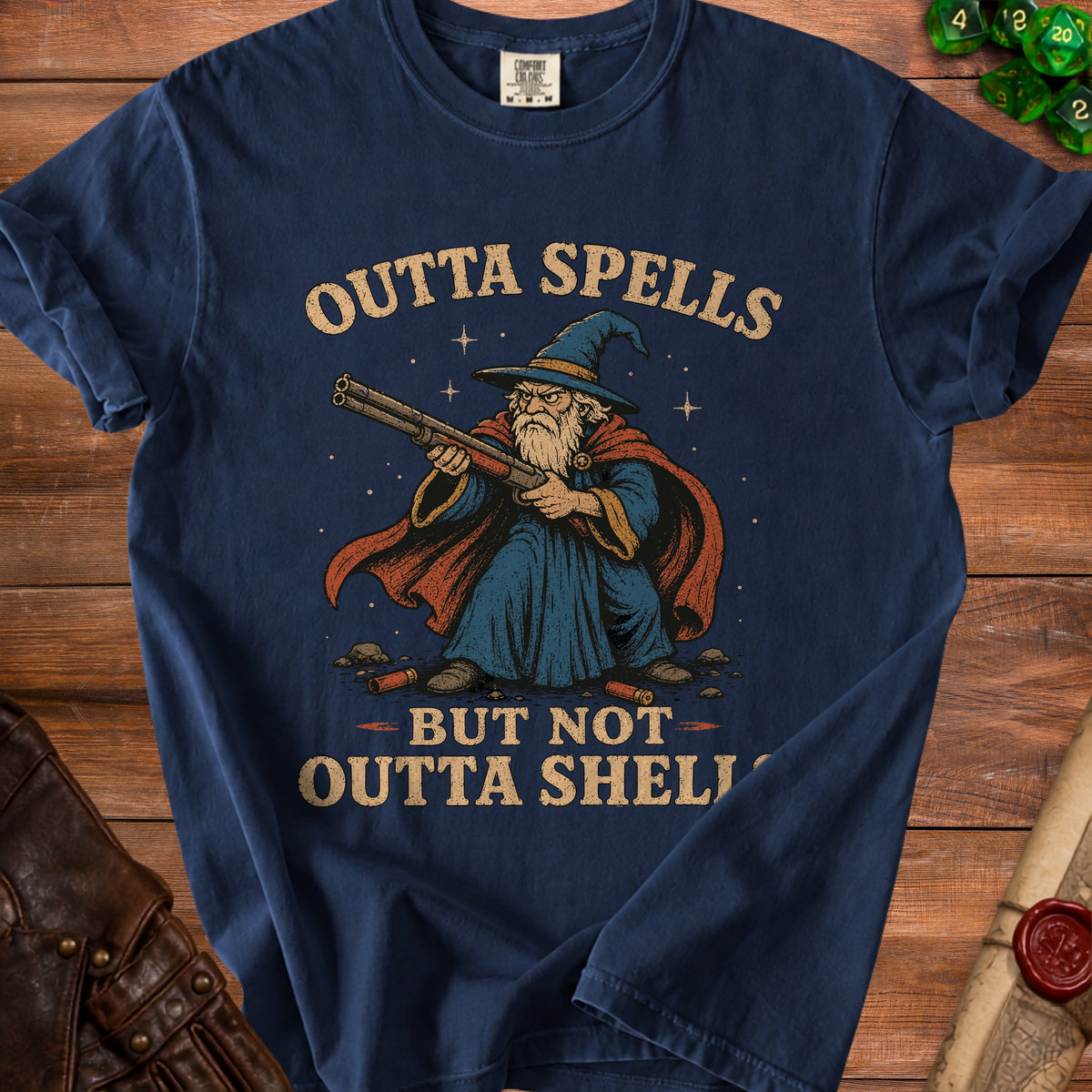 Dark blue t-shirt with wizard holding shotgun and text "OUTTA SPELLS BUT NOT OUTTA SHELL"