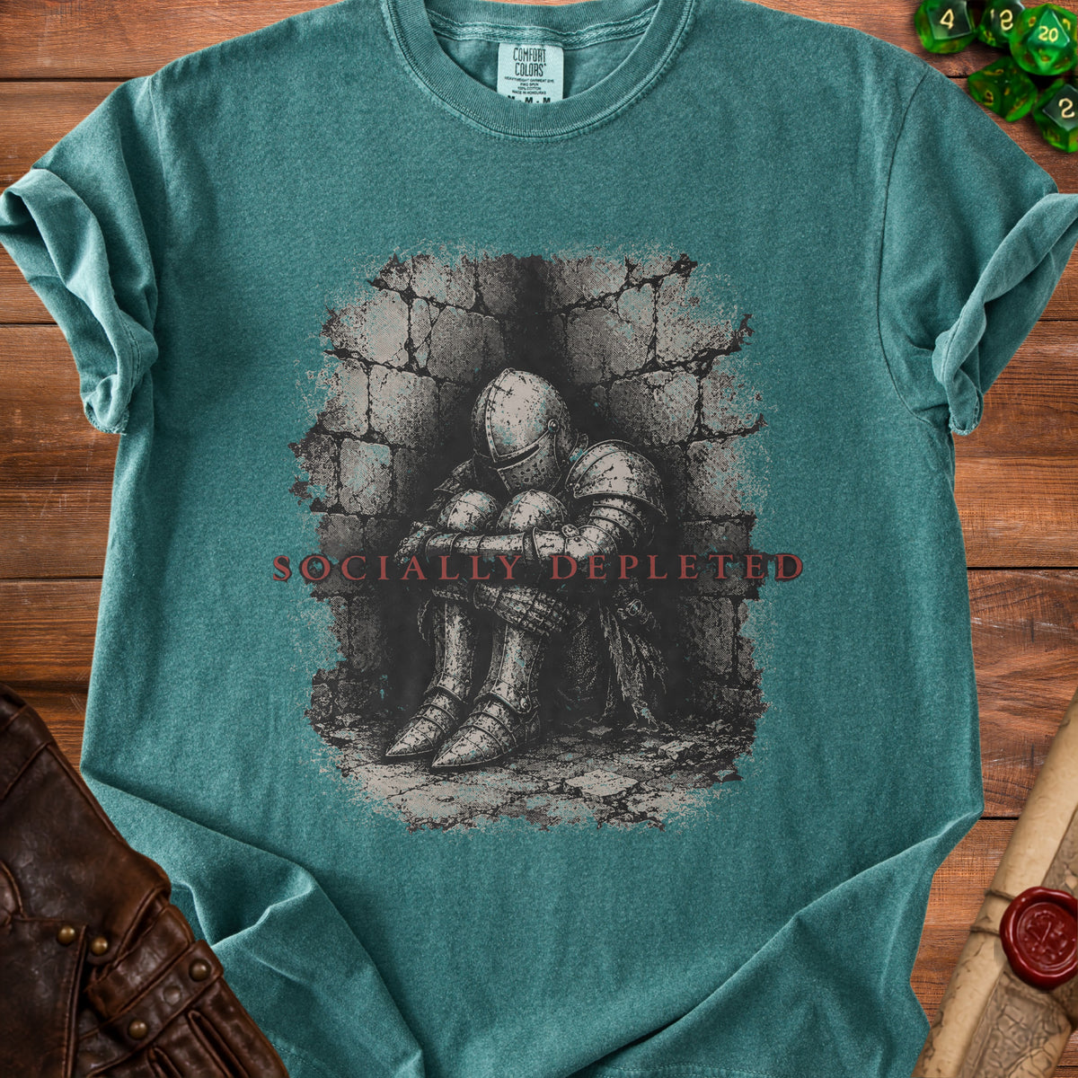 Teal t-shirt with "Socially Depleted" text over an illustration of a knight.