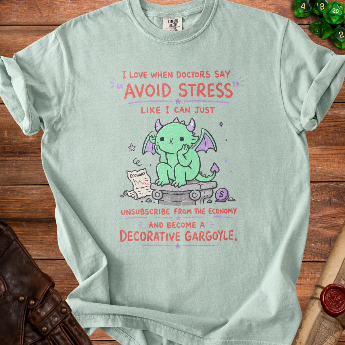 Light green t-shirt with a cute dragon graphic and text about avoiding stress.