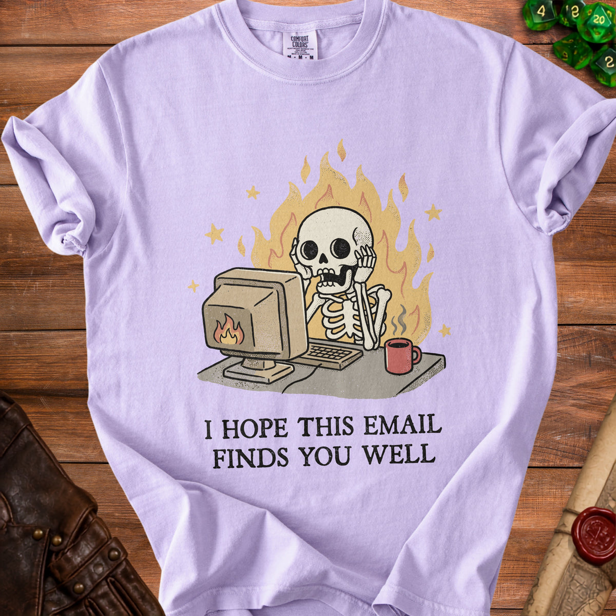 Skeleton at computer on fire with text "I HOPE THIS EMAIL FINDS YOU WELL".