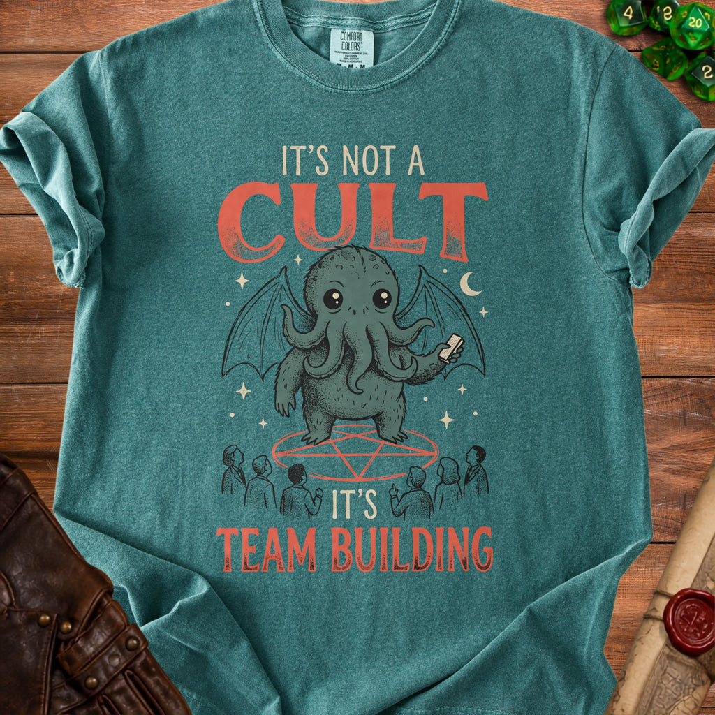 Teal t-shirt with Cthulhu illustration and "It's Not A Cult, It's Team Building" text.