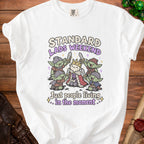 White t-shirt with "Standard Lads Weekend" and goblins graphic, reading "Just people living in the moment."