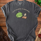 Dark grey t-shirt with a frog in a wizard hat and a ghost reading a book.