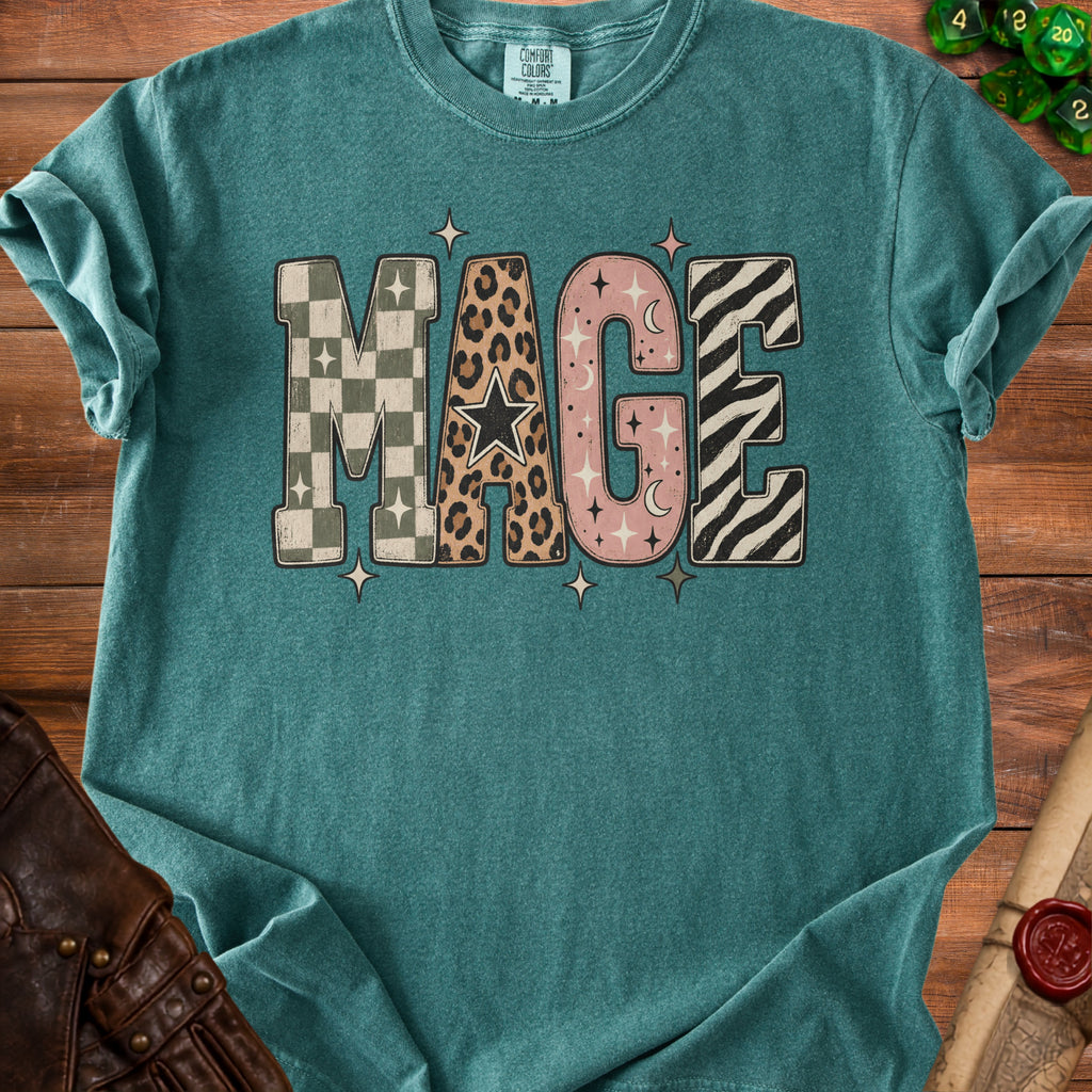 Teal t-shirt with "MAGE" graphic in various retro patterns and celestial elements.