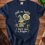 Navy t-shirt with gnome, dragon thought bubble, and text "yall so lucky i don't own a dragon."