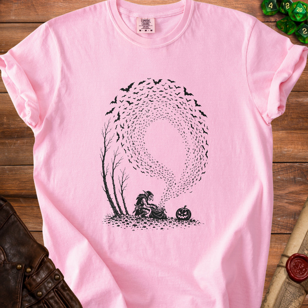 Pink t-shirt with black graphic of a goblin, pumpkin, and bats.