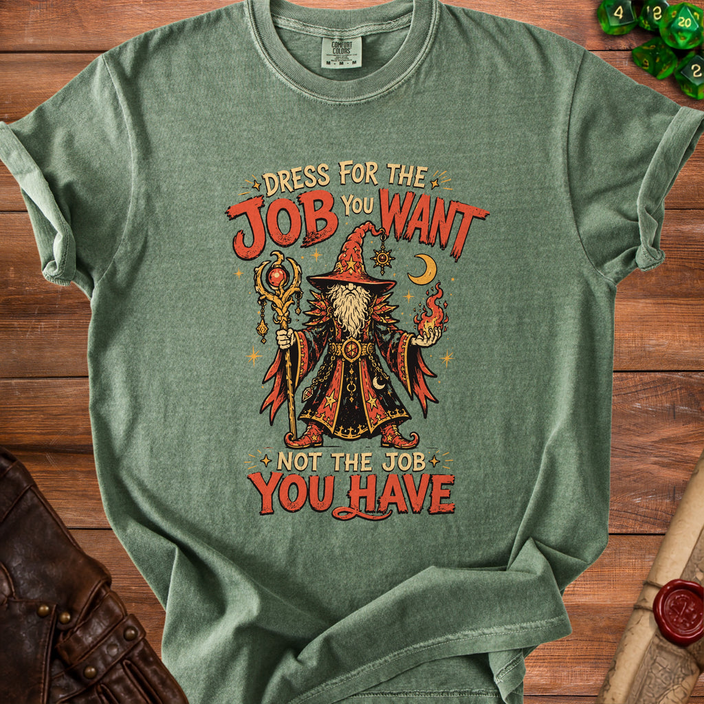 Green t-shirt with wizard graphic and text "Dress for the job you want not the job you have."