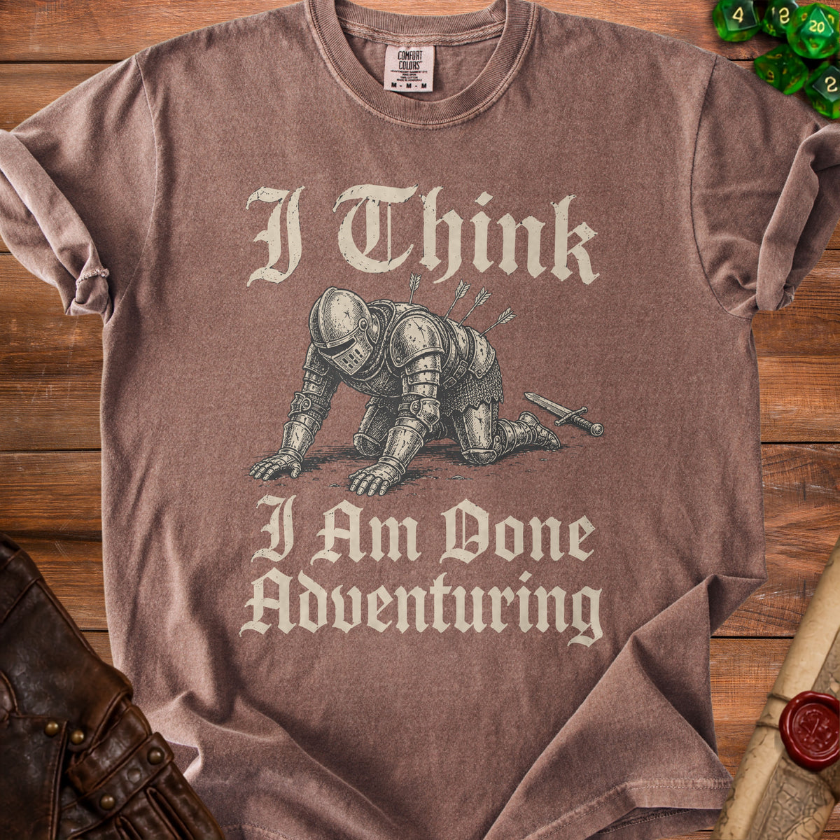 Brown t-shirt with vintage knight illustration and text "I Think I Am Done Adventuring."