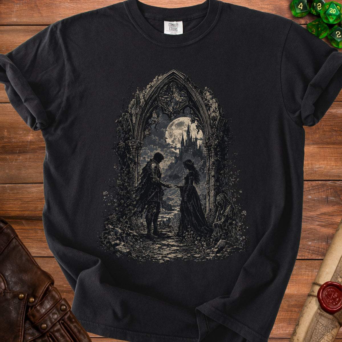Black t-shirt with gothic art of a couple and a castle under a full moon.