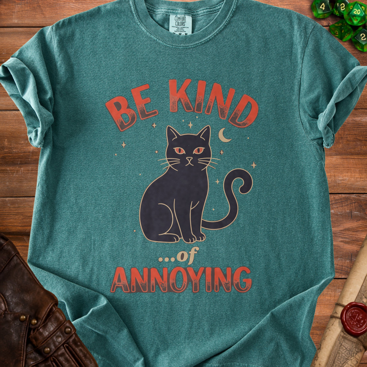 Teal t-shirt with black cat graphic and text "Be Kind ...of Annoying".