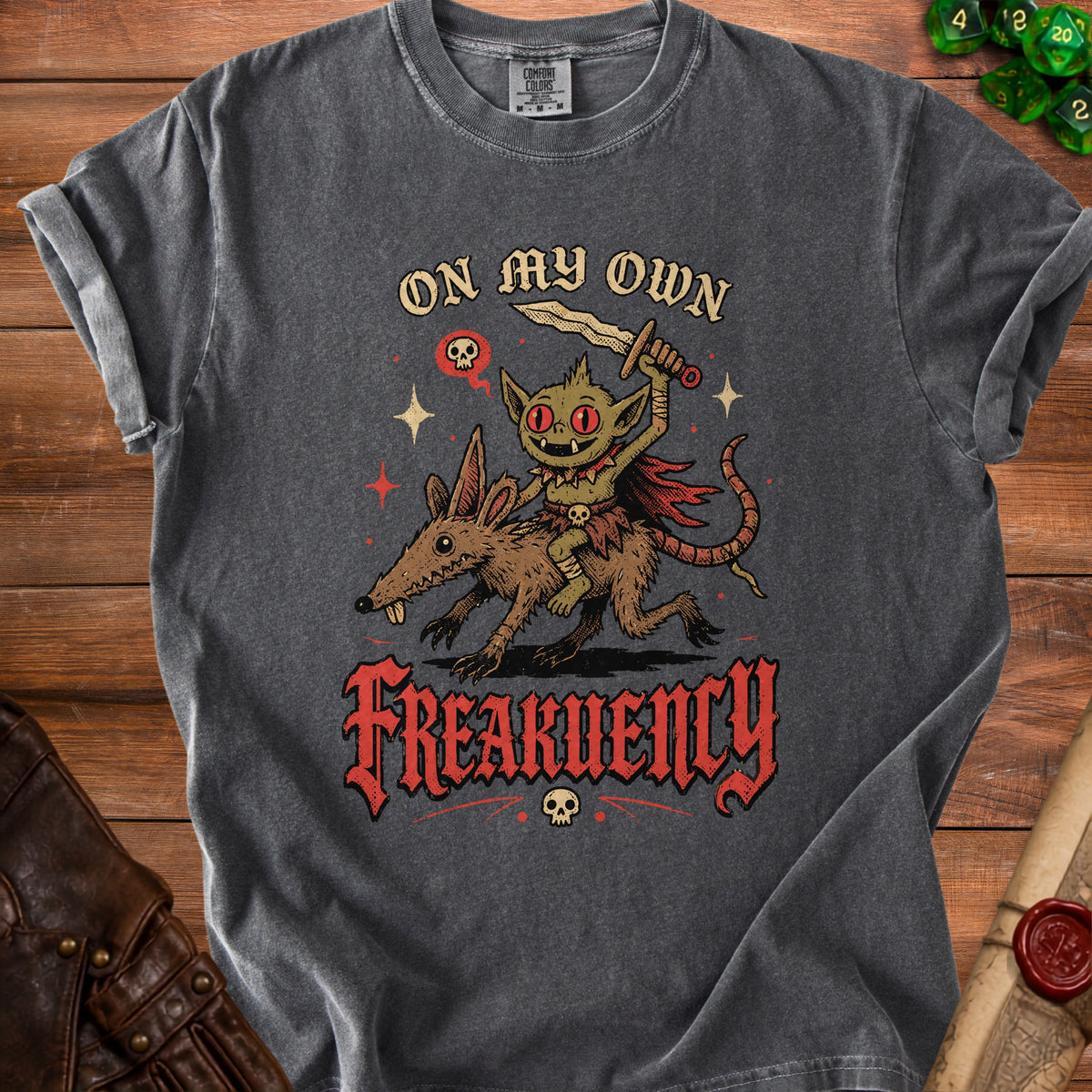 Dark gray t-shirt with goblin riding a rat, reads "On My Own Frequency."