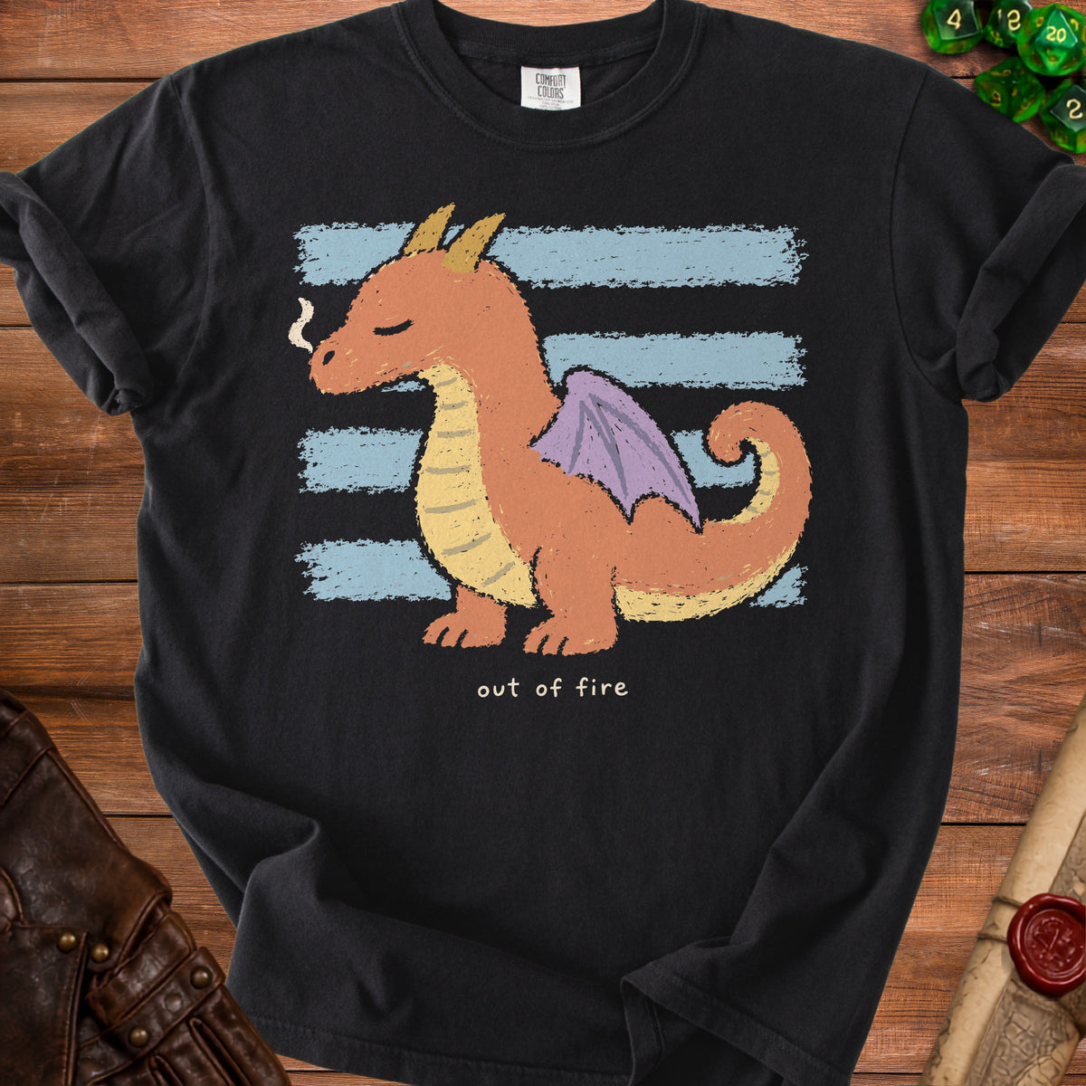 Black t-shirt with a cute orange dragon graphic and the text "out of fire".