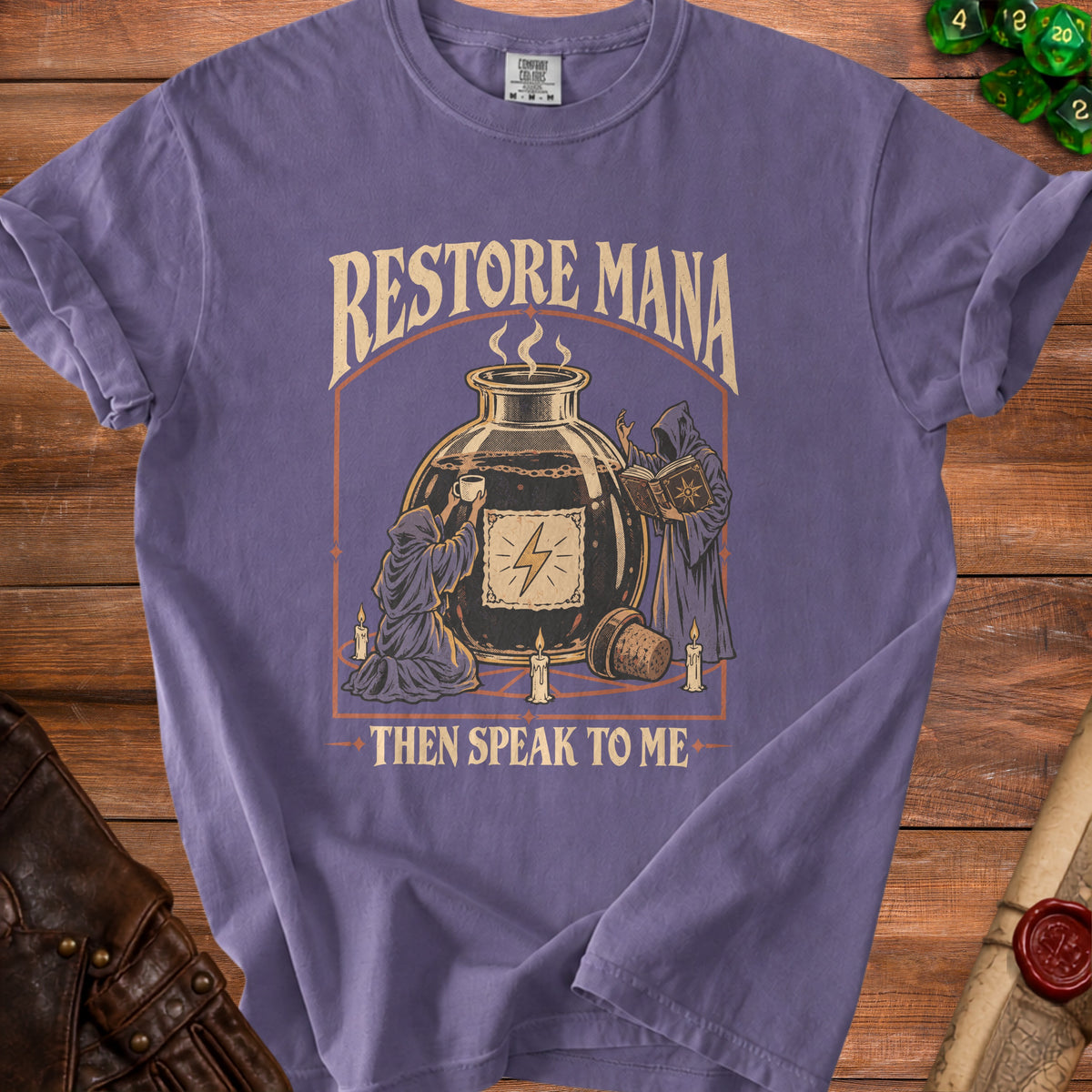 Purple t-shirt with "Restore Mana Then Speak To Me" text and fantasy illustration.