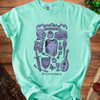 Mint t-shirt with fantasy items, "Inventory full" and "Still picking things up."