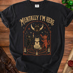 Black t-shirt with text "Mentally I'm Here" and three cats around a pentagram.
