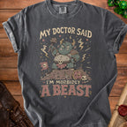 T-shirt graphic with text "My Doctor Said I'm Morbidly A Beast" and a monster.