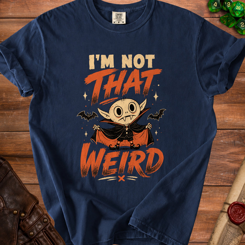 Navy t-shirt with a cartoon vampire and the text "I'M NOT THAT WEIRD".