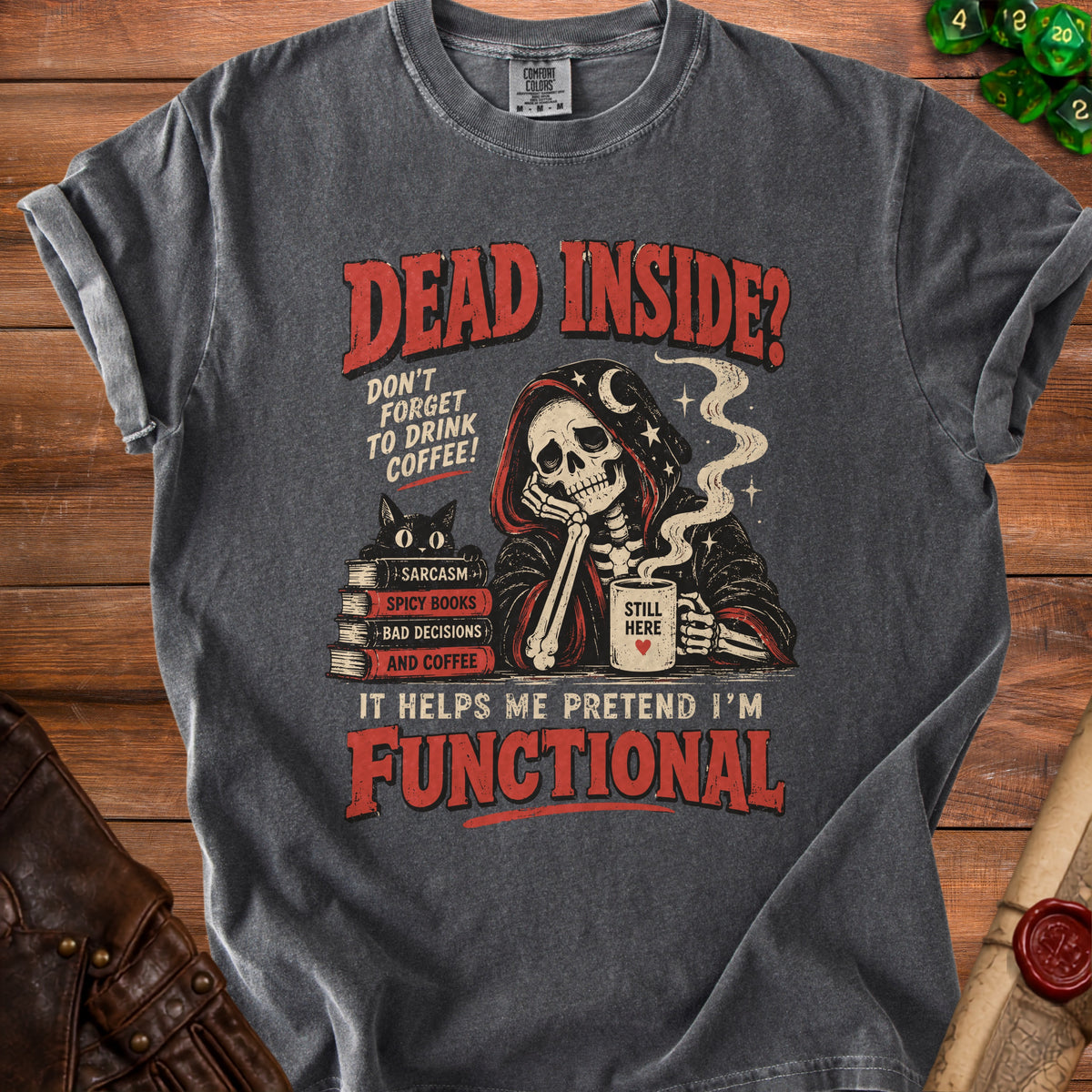 Dark grey t-shirt graphic with skeleton, black cat, books, and text about coffee.
