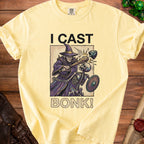 Yellow t-shirt with "I CAST BONK!" text and wizard attacking skeleton graphic.