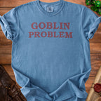 Blue t-shirt with "GOBLIN PROBLEM" printed in red text.