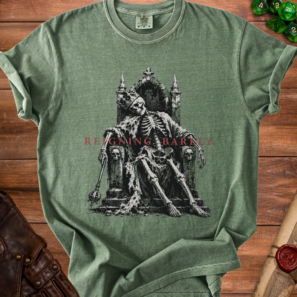 Green t-shirt with a skeleton king graphic and text "REIGNING BARNILY".