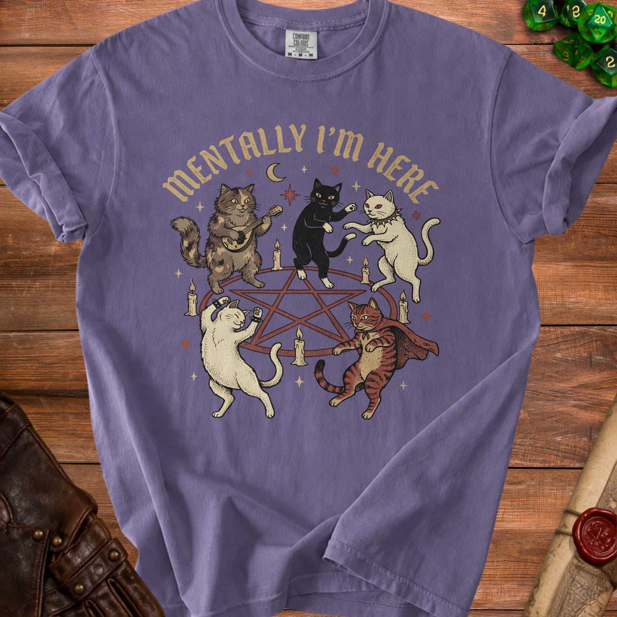 Lavender t-shirt with five cats dancing around a pentagram and candles.